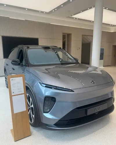 NIO EL6 electric vehicle in a showroom